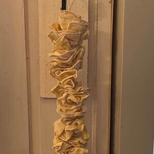 Yellow and White Ruffled Fabric Garland